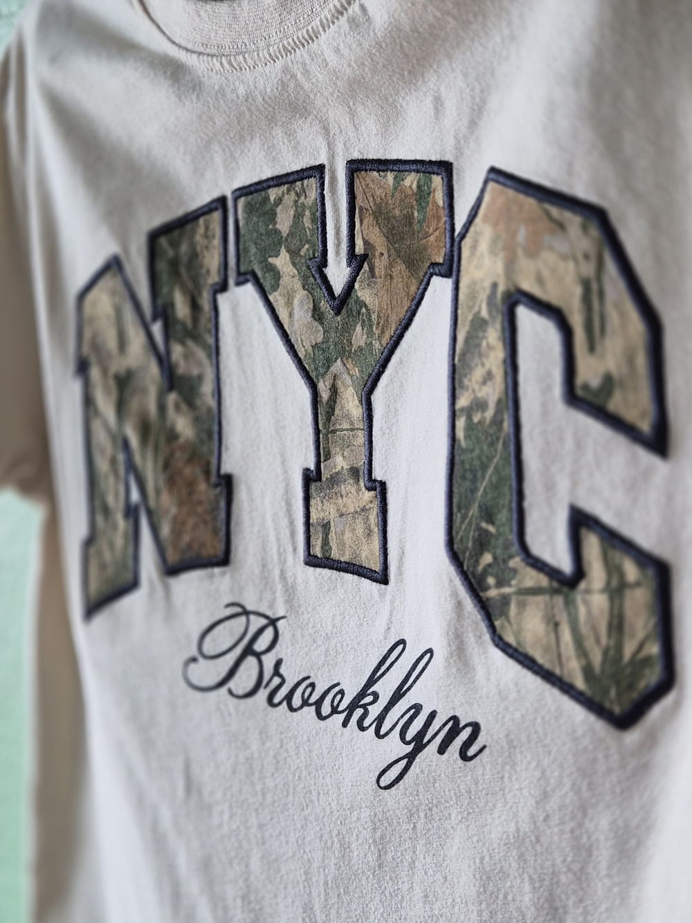 Kids Beige 'NYC Brooklyn' Graphic Tee with Camo Appliqué